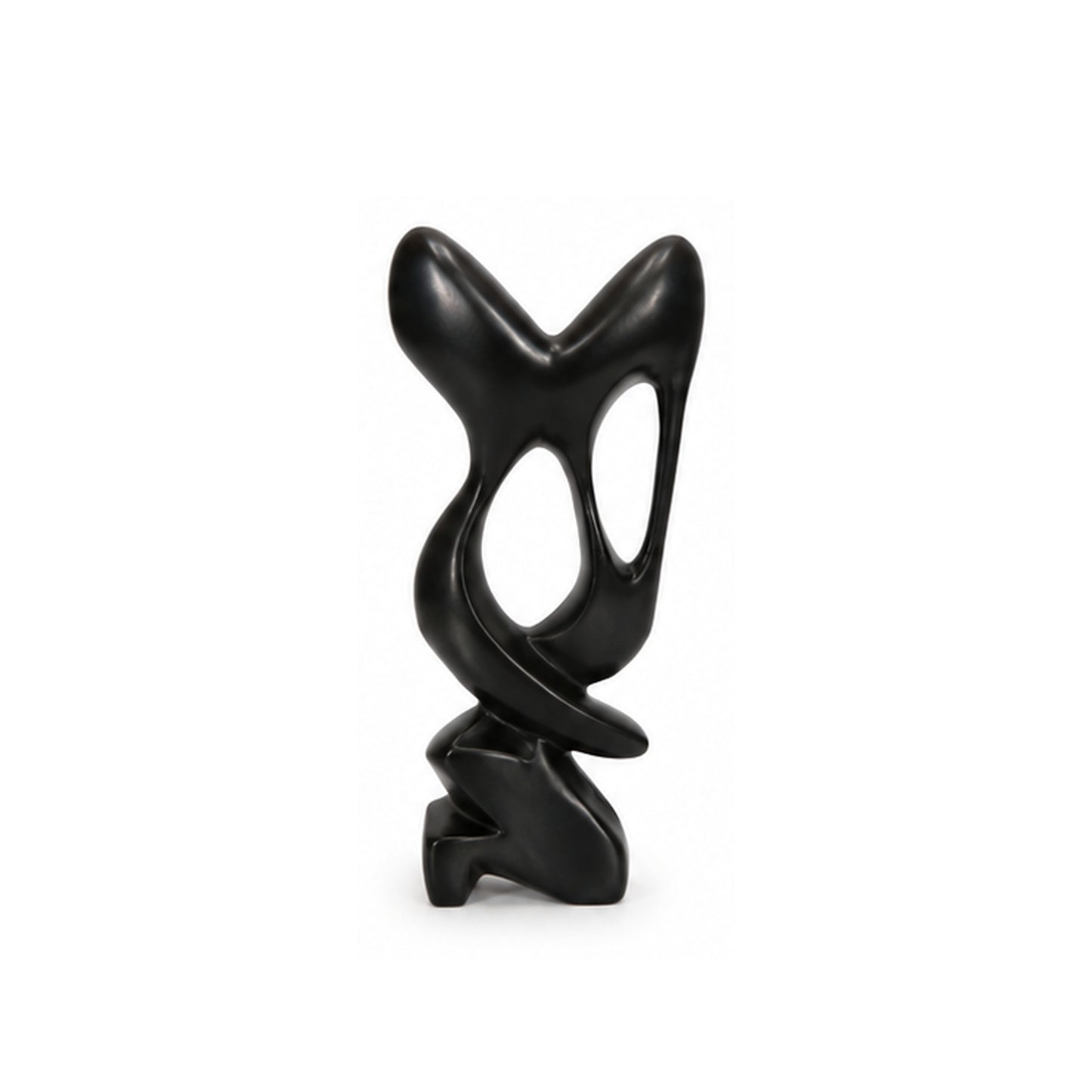A modern abstract black sculpture with smooth curved lines and organic cutouts, standing on a small sculptural base against a plain white background.
