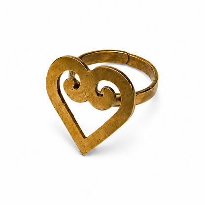 A textured brass gold-colored heart-shaped ring with a scroll detail on the inside, shown on a clean white background.