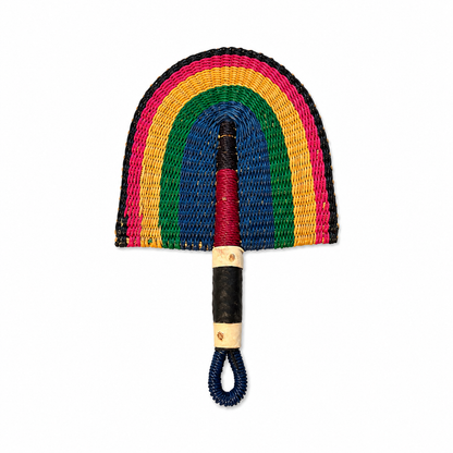 A hand-woven rainbow-shaped fan with a colorful striped arch and a wrapped handle, shown against a plain white background.
